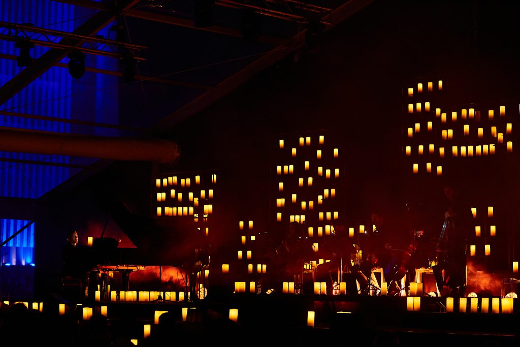 opening inauguration of Palazzo Sidera, new headquarters of Cia-Conad in Forli Italy. Boogies, individually controlled candle lights, show Dardust, Elisa Toffoli