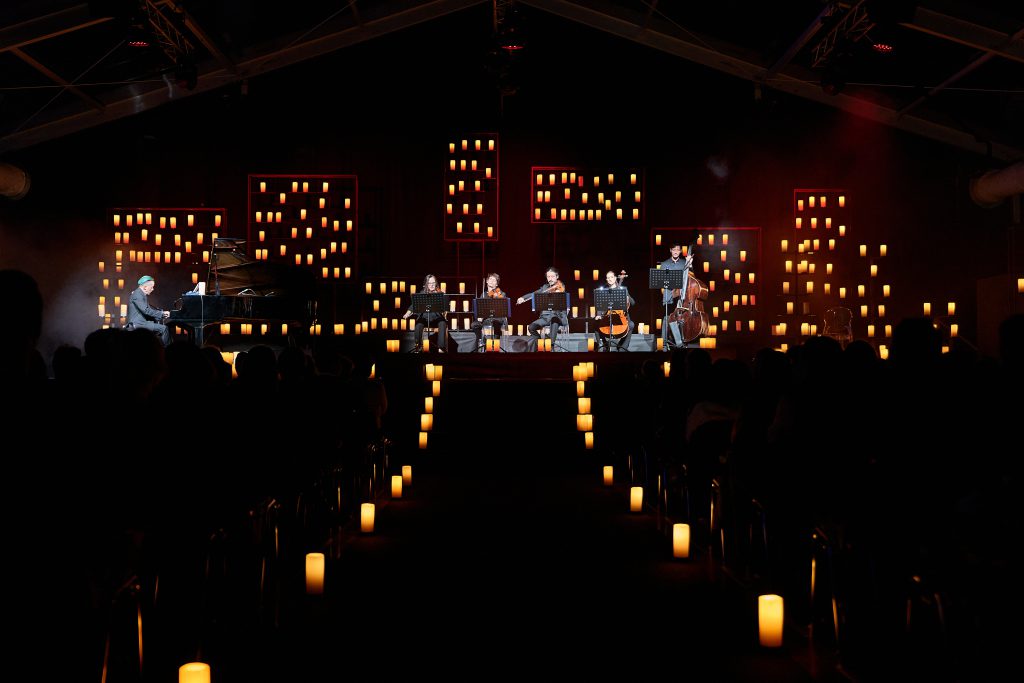 opening inauguration of Palazzo Sidera, new headquarters of Cia-Conad in Forli Italy. Boogies, individually controlled candle lights, show Dardust, Elisa Toffoli