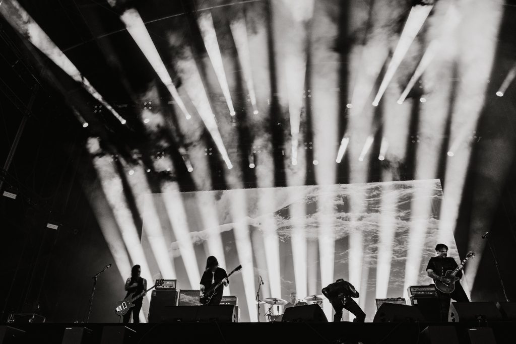 Lokerse Feesten 2025 main stage arena close up white light beams, Amenra