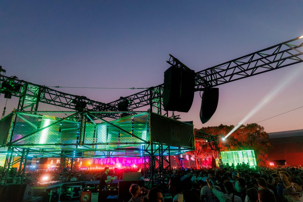 Pukkelpop Festival Kiewit Belgium 2025 stage the Booth by night lights, speakers and rigging